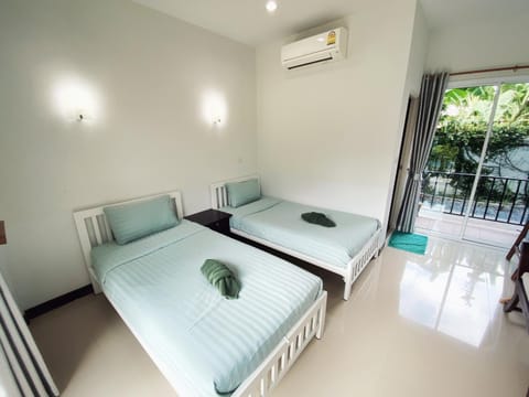 Bed, Photo of the whole room, Bedroom, towels, air conditioner