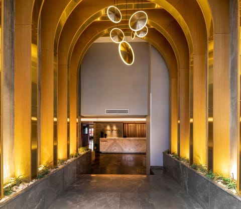 Property building, Facade/entrance, Property logo or sign, Lobby or reception, Decorative detail