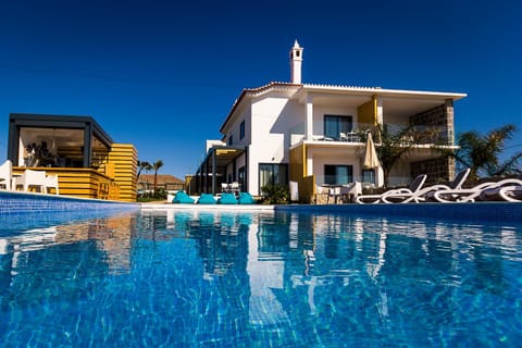 Property building, Property logo or sign, Lounge or bar, Pool view, Swimming pool