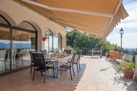 Property building, Patio, Day, View (from property/room), Balcony/Terrace, Seating area, Dining area