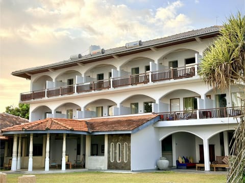 Property building, Restaurant/places to eat, Garden, Sunset