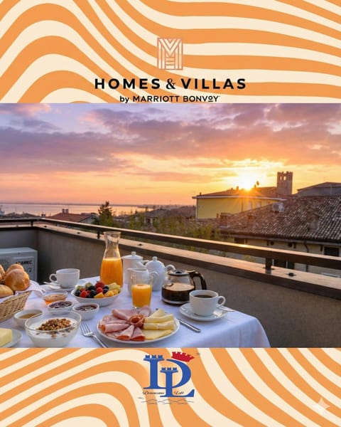 Property building, View (from property/room), Balcony/Terrace, Logo/Certificate/Sign, Lake view, Sunset