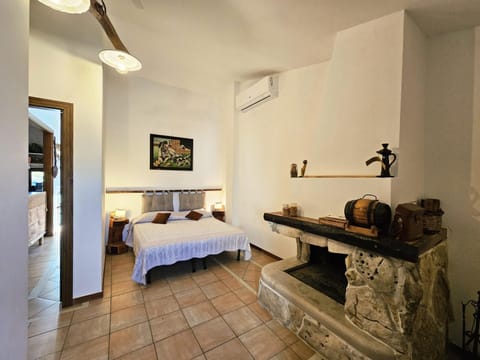 Bed, Bedroom, fireplace, air conditioner