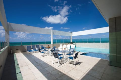 Patio, Day, View (from property/room), Sea view, Swimming pool