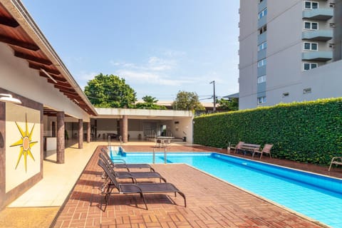 Property building, Patio, Day, Pool view, Swimming pool, sunbed