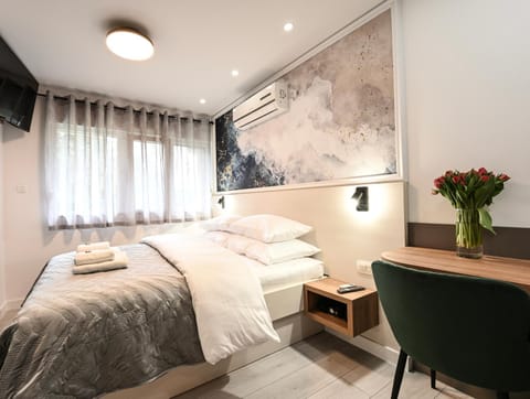 Bed, Garden view, air conditioner