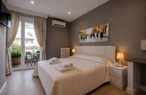Bed, Photo of the whole room, Bedroom, towels, air conditioner