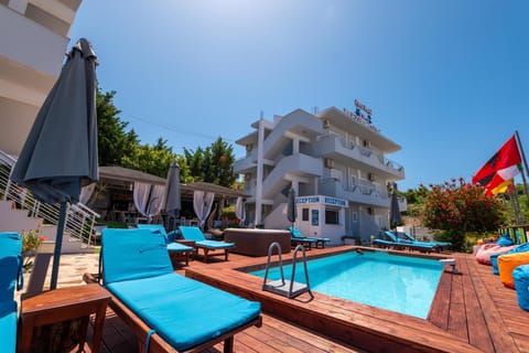 Property building, Pool view, Swimming pool, sunbed