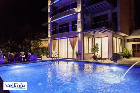 Patio, Night, Summer, Balcony/Terrace, Decorative detail, Text overlay, Swimming pool, Location