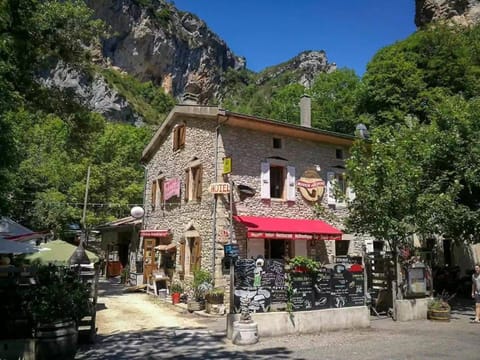 Property building, Nearby landmark, Natural landscape, Mountain view