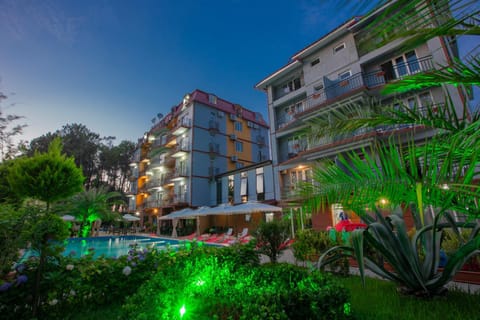 Property building, Garden, Pool view, Swimming pool, Sunset