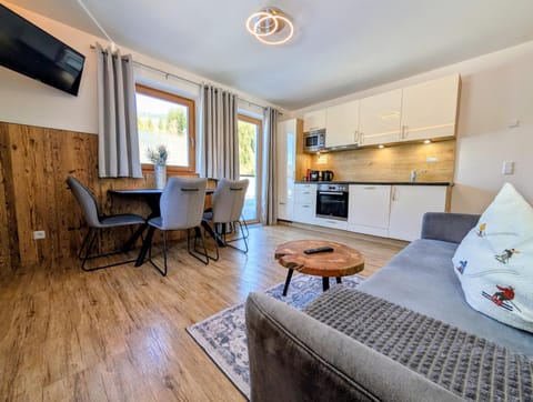 Kitchen or kitchenette, Living room, Seating area, Dining area