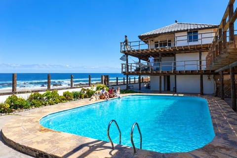 Property building, Patio, View (from property/room), Pool view, Sea view, Swimming pool