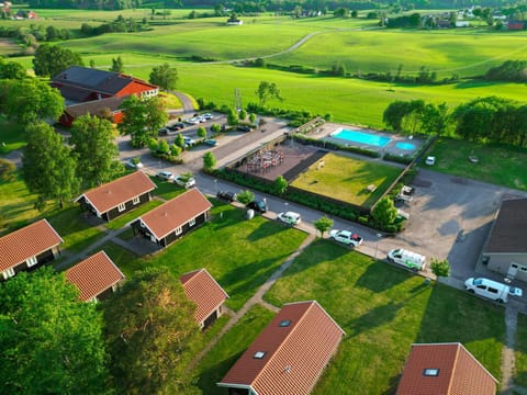 Property building, Natural landscape, Children play ground, Garden, View (from property/room), Swimming pool