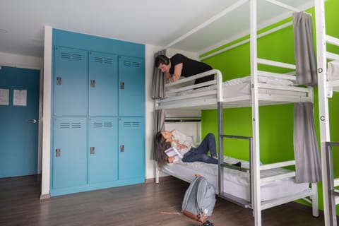 People, bunk bed, microwave