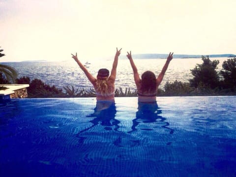 Pool view, Sea view, Swimming pool, group of guests