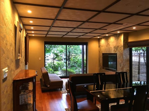Property building, Living room, Dining area, Garden view, Garden view
