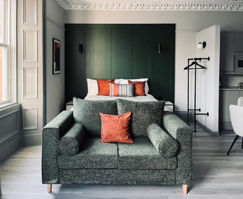 Bed, Seating area, Bedroom