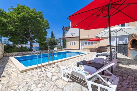 Property building, Patio, Seating area, Pool view, Swimming pool, sunbed