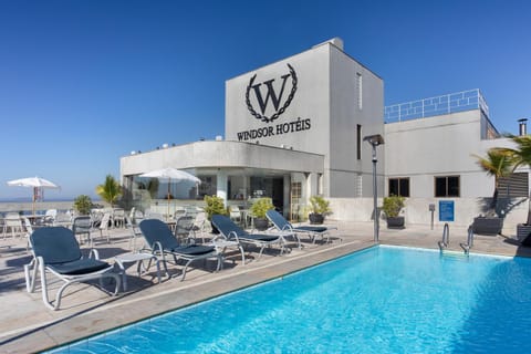 Property building, Day, Lounge or bar, Pool view, Swimming pool, sunbed