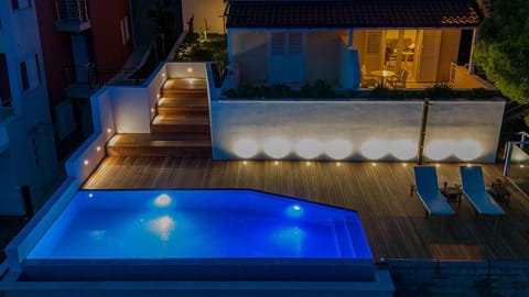Property building, Night, Swimming pool