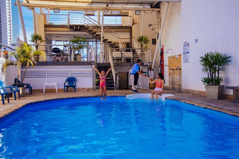 Property building, Facade/entrance, Day, People, Pool view, Swimming pool, group of guests