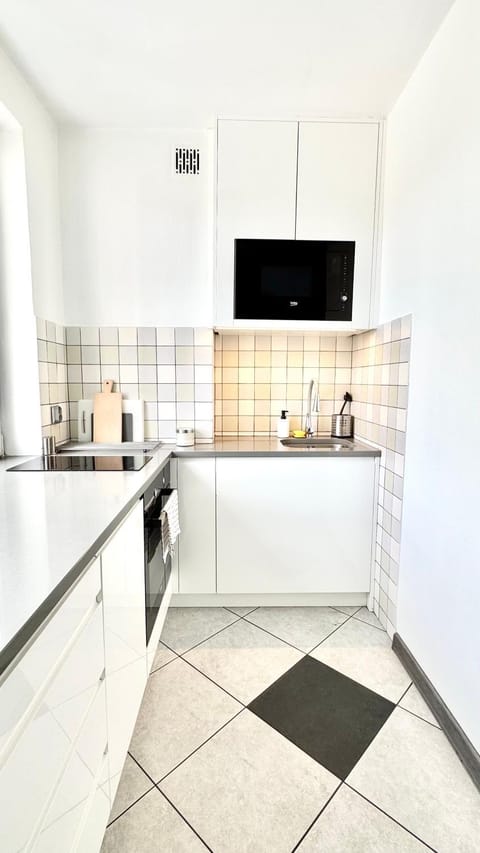 Kitchen or kitchenette, microwave, stove, kitchen