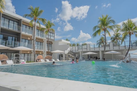 Property building, Pool view, Swimming pool, sunbed