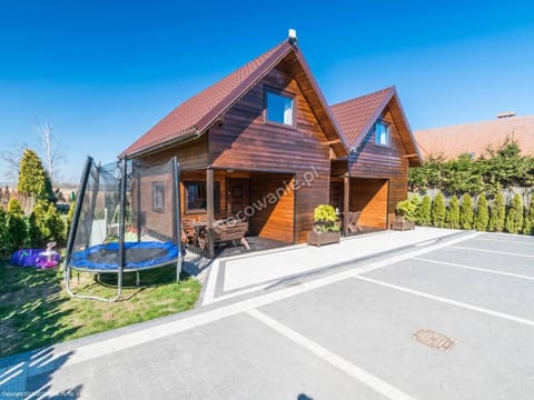 Domki Kaper Rewa Nature lodge in Pomeranian Voivodeship