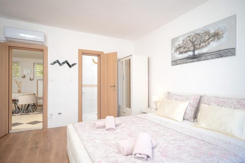 Bed, Photo of the whole room, Bedroom, towels, wardrobe