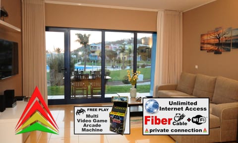 Property building, Communal lounge/ TV room, Bed, Game Room, Garden, Library, TV and multimedia, View (from property/room), Balcony/Terrace, Living room, Other, Photo of the whole room, Seating area, Dining area, Logo/Certificate/Sign, Bedroom, Meeting/conference room, Garden view, Pool view, Area and facilities, Swimming pool, Swimming pool, children, group of guests, Family, Inner courtyard view, locker, air conditioner