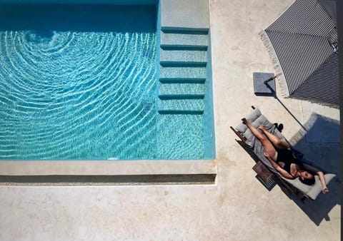 Patio, Day, People, Pool view, Swimming pool, group of guests, sunbed
