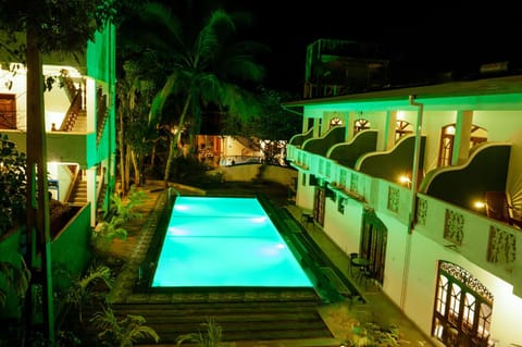 Property building, Night, Swimming pool