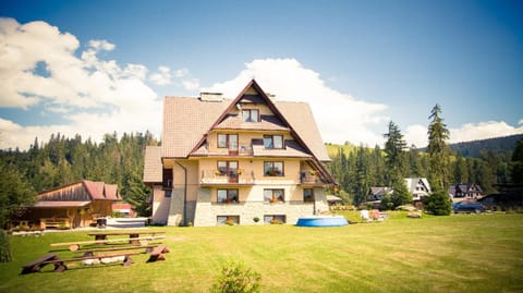 Property building, Facade/entrance, Spring, Day, Natural landscape, Garden, Evening entertainment, Garden view, Mountain view, sunbed