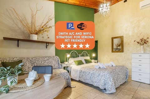 Bed, Property logo or sign, Living room, Photo of the whole room, Logo/Certificate/Sign, Bedroom, Text overlay, Certificate/Award, air conditioner