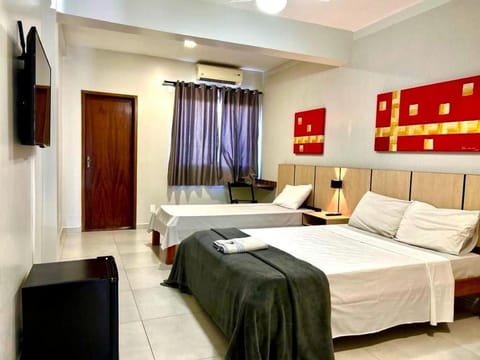 Bed, TV and multimedia, minibar, towels, wardrobe, air conditioner