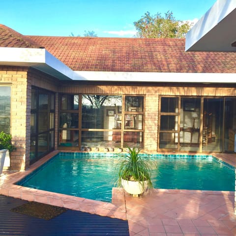 Property building, Patio, Day, Pool view