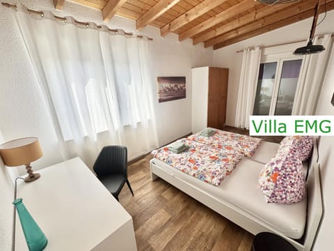 Bed, Decorative detail, Seating area, Bedroom, towels, wardrobe