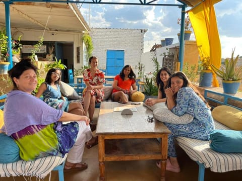 View (from property/room), Balcony/Terrace, Seating area, group of guests