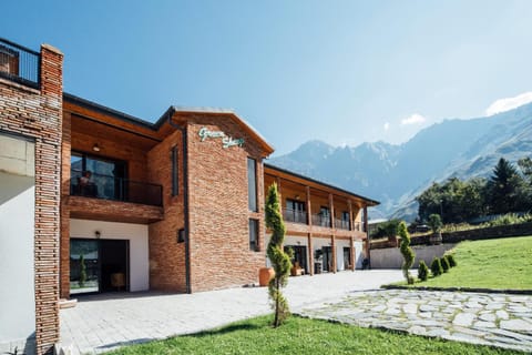 Property building, Facade/entrance, Spring, Day, Natural landscape, Mountain view