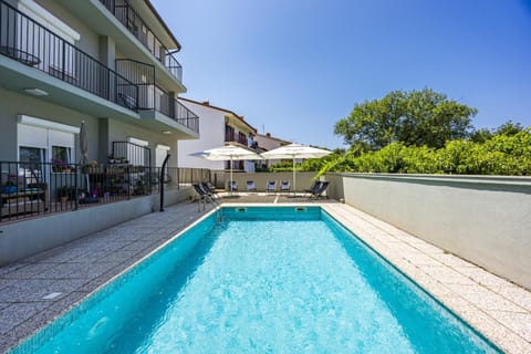 Property building, Patio, Day, View (from property/room), Balcony/Terrace, Pool view, Swimming pool, sunbed