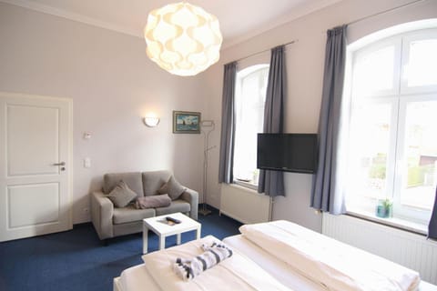 Kapitaenshaus-Lassen-Zimmer-Amistad Bed and Breakfast in Westerland