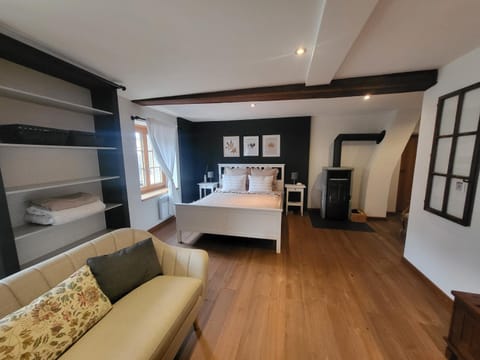 Bed, Living room, Seating area, Bedroom