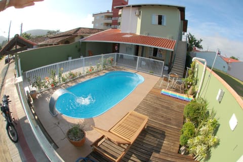 Property building, Patio, Natural landscape, View (from property/room), Pool view, Swimming pool, sunbed
