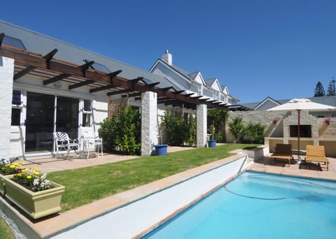 Property building, Patio, Garden, Swimming pool