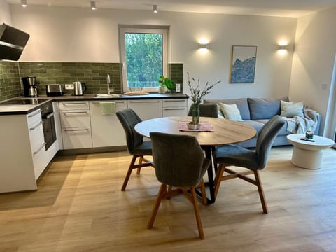 Kitchen or kitchenette, Living room, Seating area, Dining area, dishwasher, stove, toaster