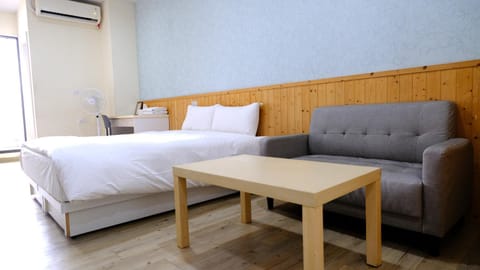 Property logo or sign, Seating area, Bedroom, On site, air conditioner, air conditioner