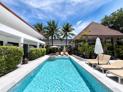 Property building, Pool view, Swimming pool, sunbed