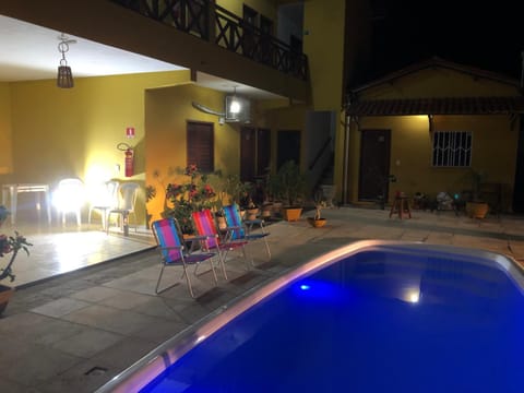 Property building, Night, Pool view, Swimming pool, sunbed
