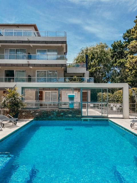 Property building, Patio, Day, View (from property/room), Balcony/Terrace, Pool view, Swimming pool